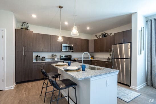 Modern kitchen with island and stainless steel appliances